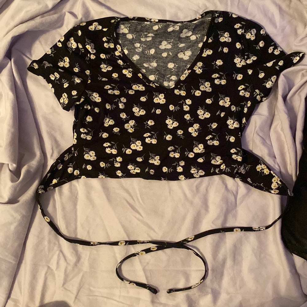 Black mini wrap around, cropped shirt with white flowers